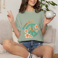 Peace Out T‑Shirt — Retro Floral Peace Sign Tee with ‘Peace Out…’ Text